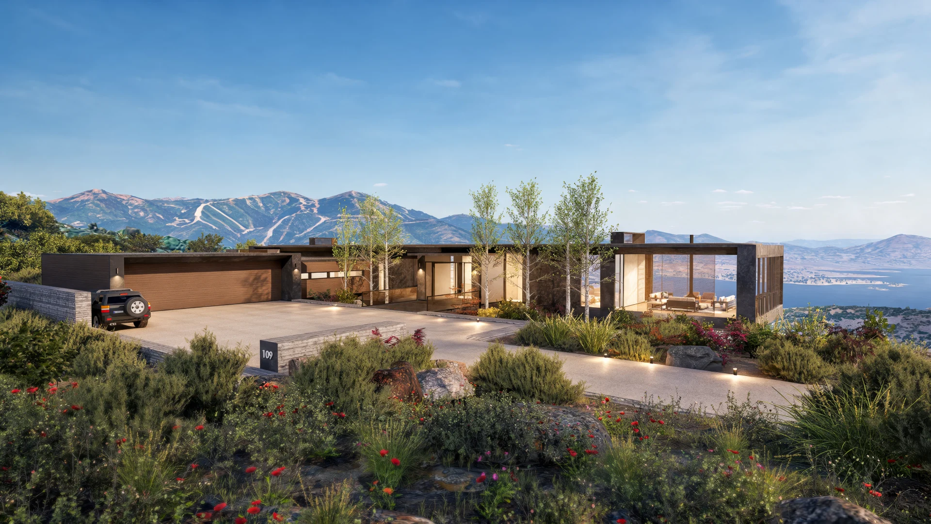 Marcella HC_109 mountain residence with a landscaped approach and panoramic glazing